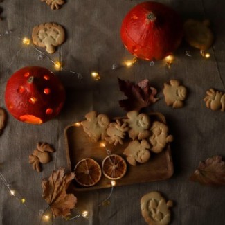Fairy lights surround an assortment of Halloween Cookies.